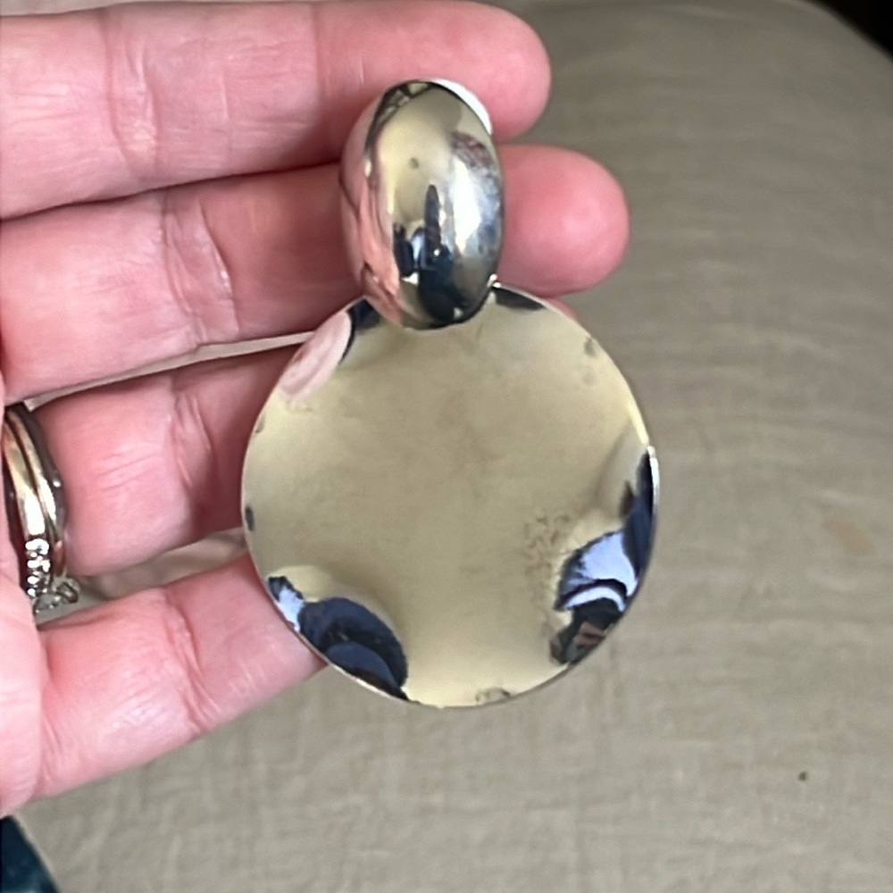 Round silver statement earring, brand new